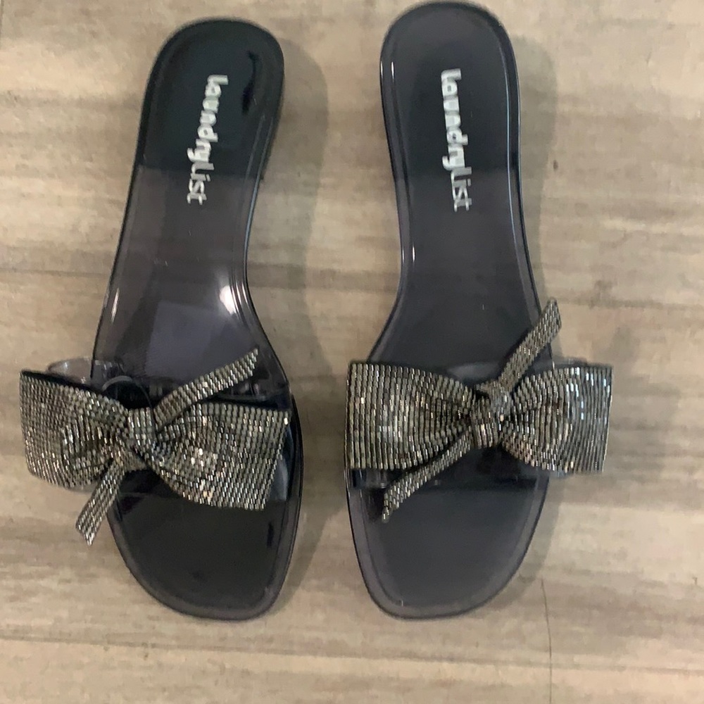 Clear black sandals sz 8 never worn with silver bow